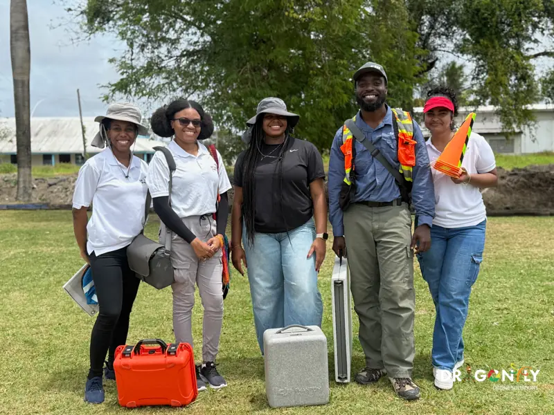 Dragonfly survey team with field equipment on site