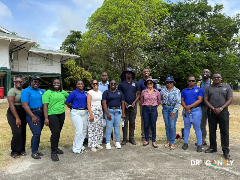 The Dragonfly team with partners at a field training day in Guyana